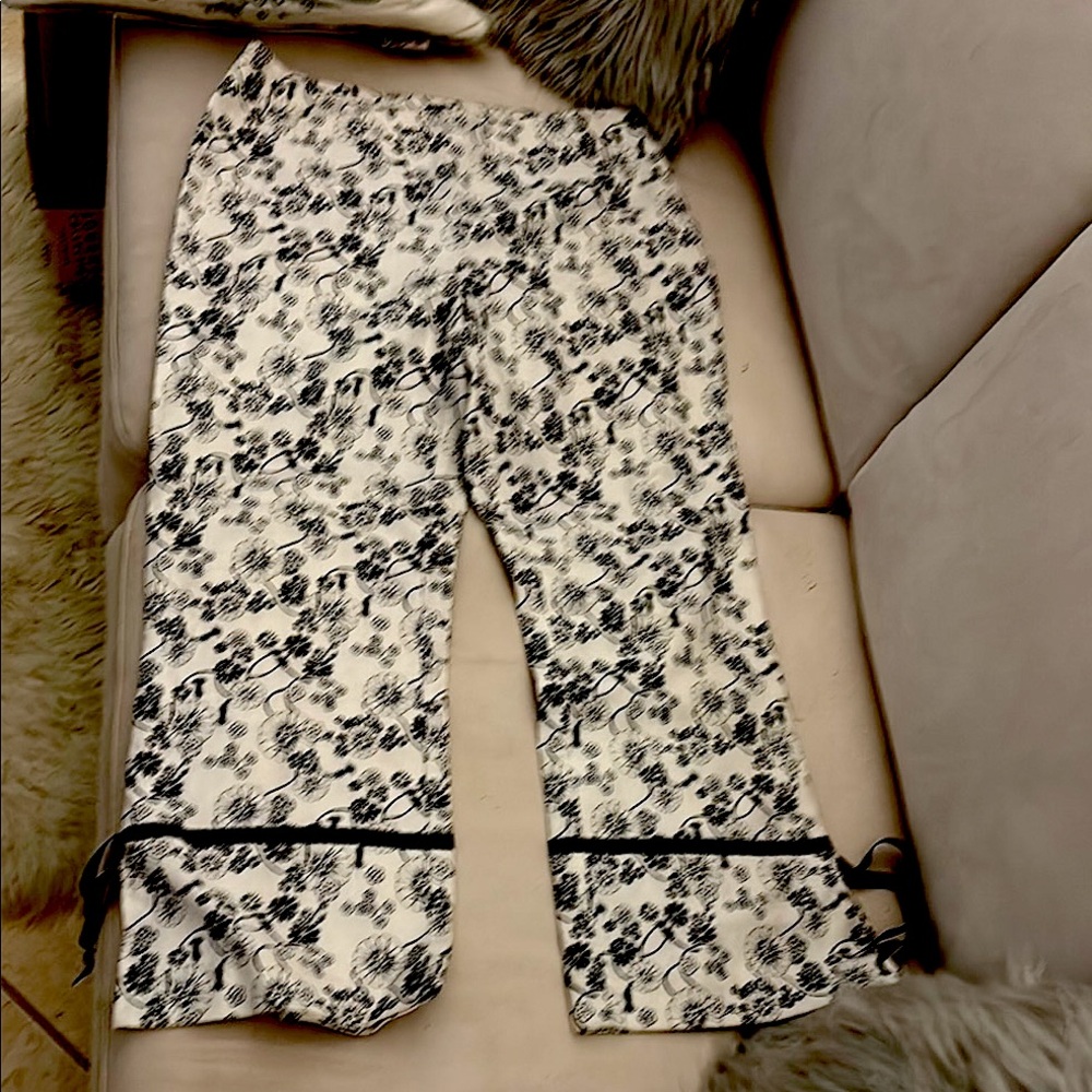 Inc. black and white capris with black ribbon around bottom